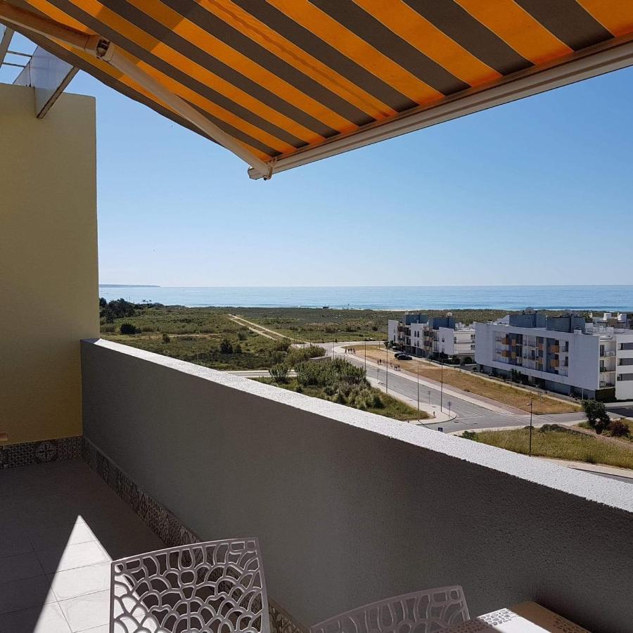 Vue Panoramique Sur Mer Condominio Do Mar Lagos Bagian luar foto
