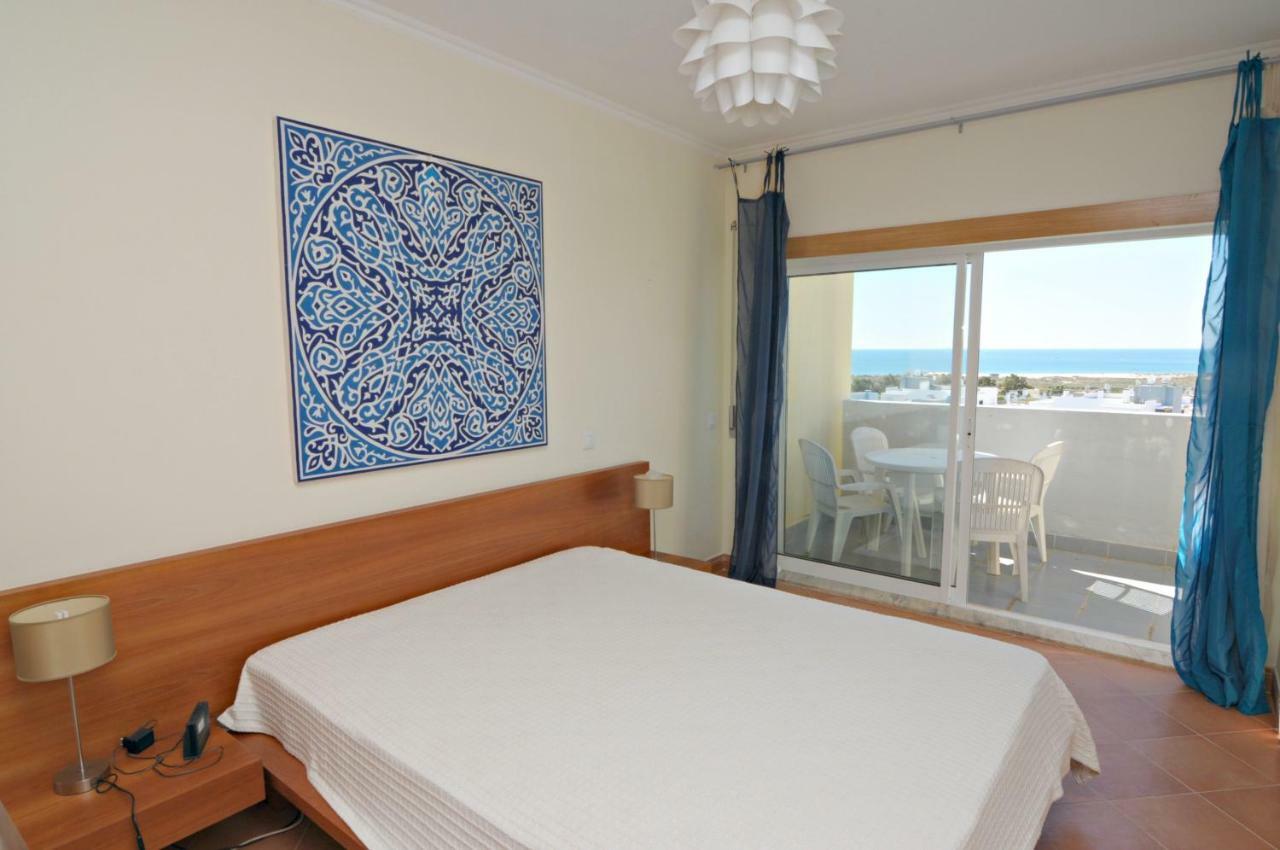 Vue Panoramique Sur Mer Condominio Do Mar Lagos Bagian luar foto